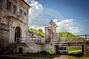 View of the old castle on sunny day against the blue sky in Zolochiv, Lviv region in Ukraine.