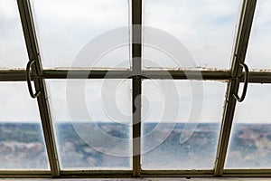 View of the old dirty frosted roof top window