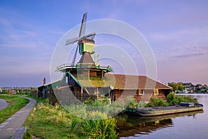 View of an old Dutch Windmill in Zaanse Schans near Amsterdam, Netherlands