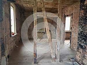 View of an old empty brick house from the inside