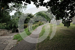 View of an old English cemetery showing thew various styles of gravestones.