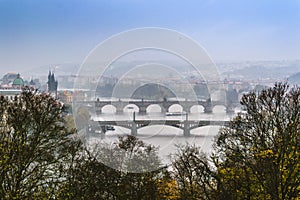 A view of old famous bridges, Prague old town and Vltava river from popular view point in the Letna park Letenske sady
