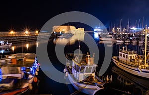 View of old harbour of Heraklion with Venetian Koules Fortress at the night. Crete, Greece. Heraklion by night.