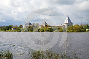 View of the Old Ladoga fortress from the right bank of the Volkhov river, cloud day. Leningrad region, Russia