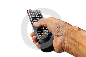 View of old man hand press the button on television remote control to select the television program on white background