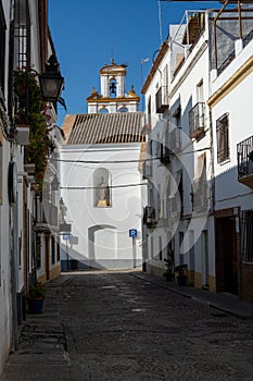 View on old part of Cordoba, San Basilio quarter with white houses and flowers pots photo