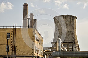 View of old power plant with big concrete furnaces . Fallen chemical communist industry