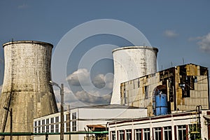 View of old power plant with big concrete furnaces . Fallen chemical communist industry