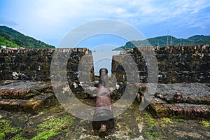View of an old spanish cannon in a colonial fort in Portobelo, P