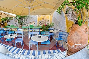 View of the old-style, restaurant in the Oia village on Santorini in Greece