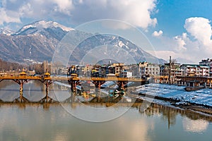 View of  old town along the lake in the center of Srinagar during winter evening , Srinagar , Kashmir , India