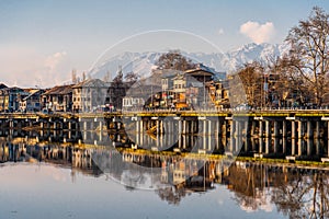 View of  old town along the lake in the center of Srinagar during winter evening , Srinagar , Kashmir , India