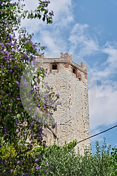 View from the old town of Malcesine in Italy to the tower of the Scaliger Castle