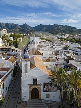 view of the old town of Marbella with sierra blanca in the background