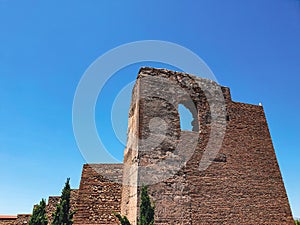 view of an old wall ruin inside the the Alcazaba in the City of Malaga, Andalusia, Spain photo