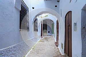 View of the old walls of Tetouan Medina quarter in Northern Morocco. A medina is typically walled, with many narrow and maze-like