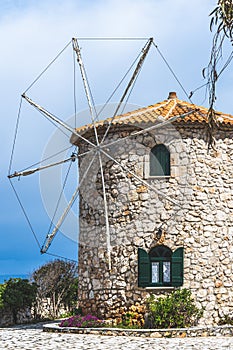 View of the old windmill in Skinari Cape