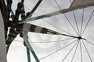 Old wing wave and unrestrained wings at a windmill photo