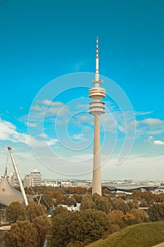 View on Olympiapark with Olympic tower at Munich, Bavaria, Germany. Green park at city.