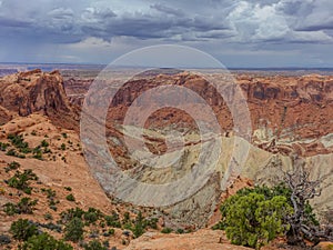 View of one of the canyons in Canyonlands National Park under a stormy sky