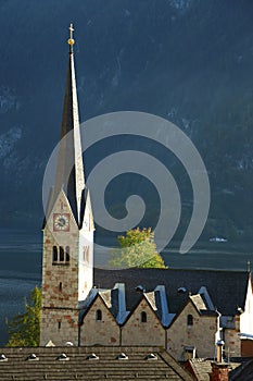 View of one of the Hallstatt`s landmarks the church clock tower