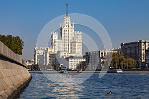 View of one of the Stalin`s skyscrapers in Moscow from the embankment of the Moscow River