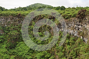 View of one of the twin volcanic craters in the highlands of Santa Cruz