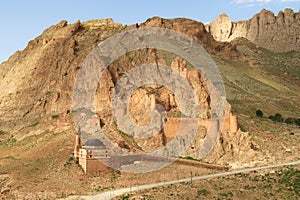 View onto the remains of the Dogubeyazit Castle, Kalesi built onto a steep mountain, steep rocks, cliffs, Dogubeyazit, Turkey