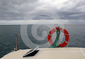 View of the open ocean from a yacht on a cloudy day