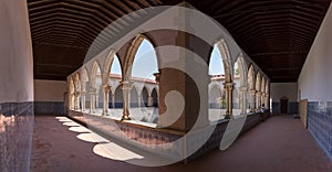View at the ornamented romanesque wash cloister, or Claustro da Lavagem, an iconic piece of the Portuguese romanesque type, on photo