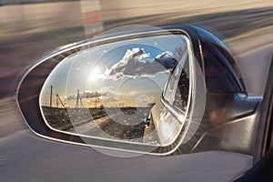 View of the outside car rearview mirror