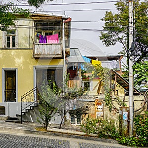 View of the outside of the household, clothes dries on ropes on clothespins, Tbilisi Georgia