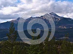 View over Athabasca River Valley in Jasper National Park, Alberta, Canada on cloudy day in autumn season.