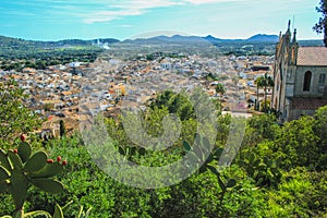 View over beautiful mediterranean village of Arta - Parish Church of the Transfiguration of the Lord on the right - Mallorca, photo