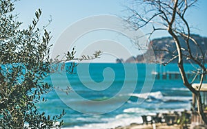 View over the blue sea, beach and castle hill of Alanya