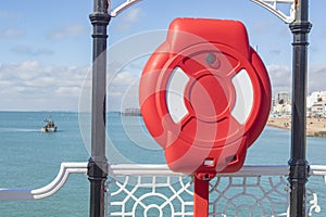 View Over Brighton Beach With Safety Red Buoy