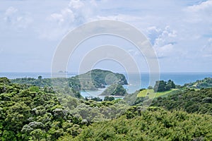 View over bush to Tutukaka Harbour and The Poor Knights Islands, Northland, New Zealand, NZ photo