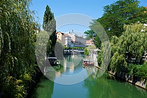 View over calm Ljubljanica river in the city centre of Ljubljana