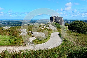 View over Carn Brea Castle and Redruth towards St Agnes Head from Carn Brea, Cornwall