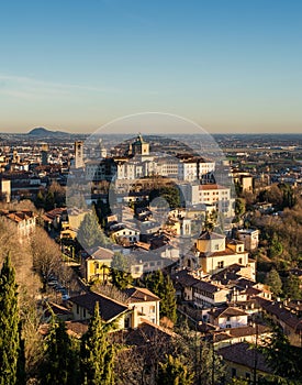 View over Citta Alta or Old Town buildings in the ancient city of Bergamo, Lombardia, Italy on a clear day, taken from