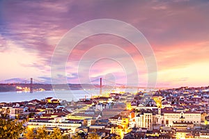 View over the city of Lisbon and 25 abril bridge at sunset, Portugal