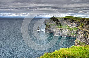 View over the cliffs of moher in Ireland to the ocean photo