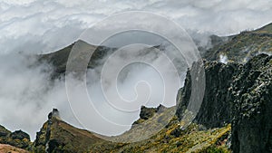 View over the clouds from slopes of Pico do Arieiro, Madeira timelapse photo