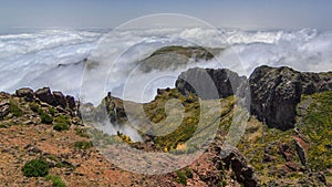 View over the clouds from slopes of Pico do Arieiro, Madeira timelapse photo