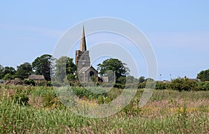 View over community field to local church, Pilling