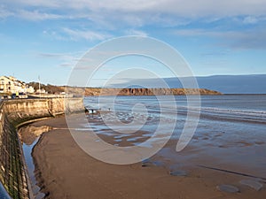 View over Filey beach to Filey Brigg, North Yorkshire, England