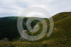 View over the flank of Le Hohneck mountain over dramatic landscape