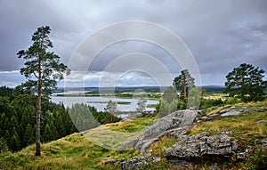 View over forest and lake. Overcast day in Karelia