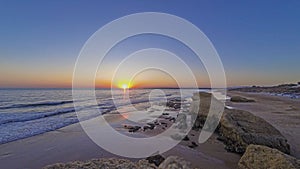 View over Gale beach in Portuguese Algarve in the evening during sunset