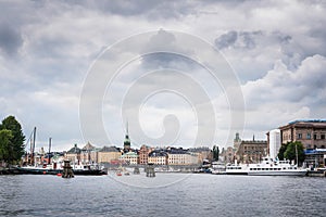 View over Gamla Stan Old Town district in Stockholm, Sweden, seen from water, Baltic sea